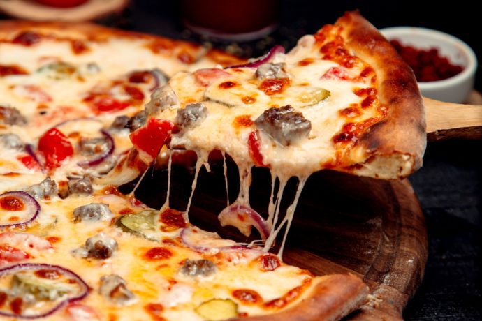 slice-of-crispy-pizza-with-meat-and-cheese